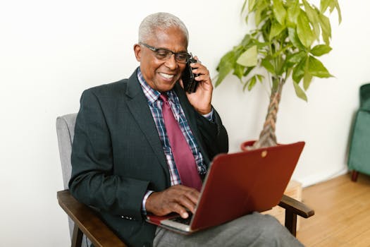 senior couple smiling while meeting with a financial advisor