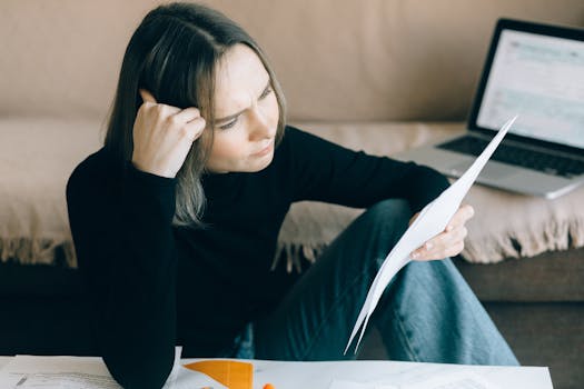 senior person reviewing credit report