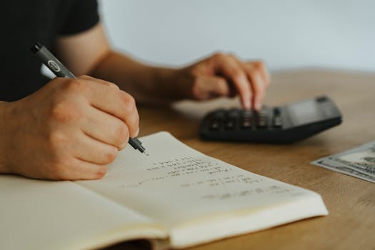 retiree planning budget at kitchen table