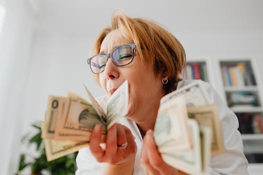 retired woman celebrating financial freedom