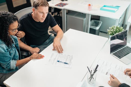 retired man discussing finances with an advisor