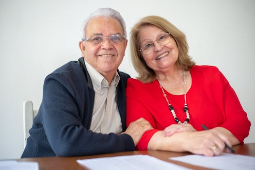elderly couple reviewing mortgage documents