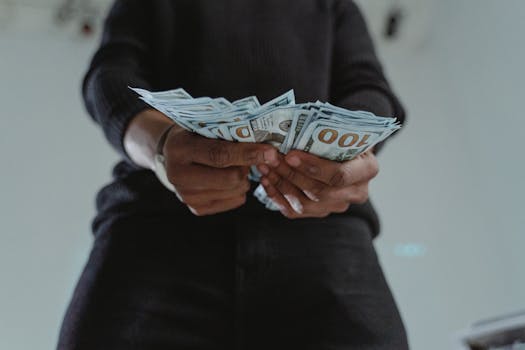 a stack of dollar bills representing liquidity