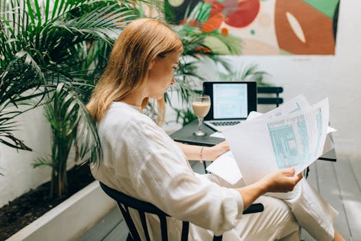 a retiree reviewing financial documents at home