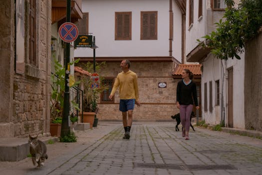 senior couple walking through a neighborhood looking at houses