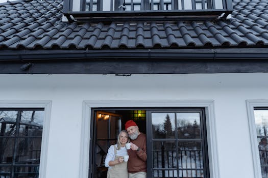 retired couple enjoying coffee on their porch